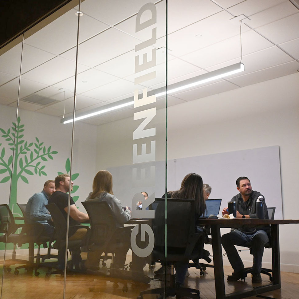 Agile development team working together in a conference room